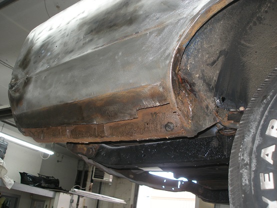 How do you repair surface rust on a vehicle?