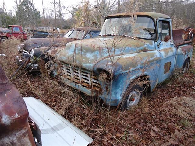 1956 Chevy pickup truck in field