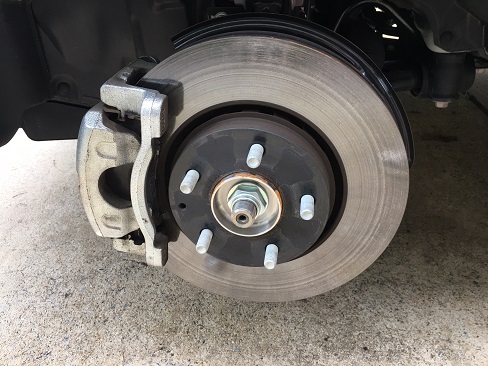 check brakes when rotating tires