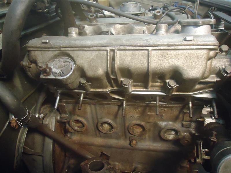 replace exhaust manifold studs on Fiat Spider twin-cam engine Fiat Spider repair engine oil leak