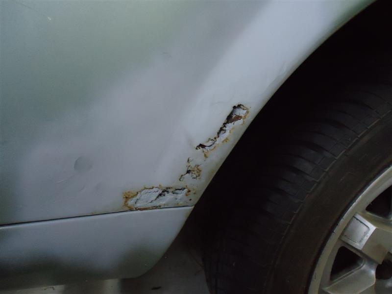 rust repair on quarter panel