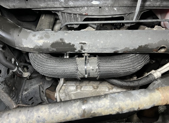 remove lower radiator hose 2016 Jeep Wrangler