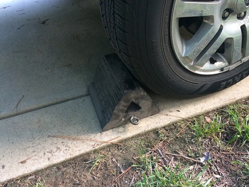 chock the wheel opposite to where you are lifting wheel chock
