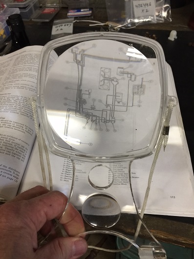 Magnifying glass with large viewing area for reading small prints