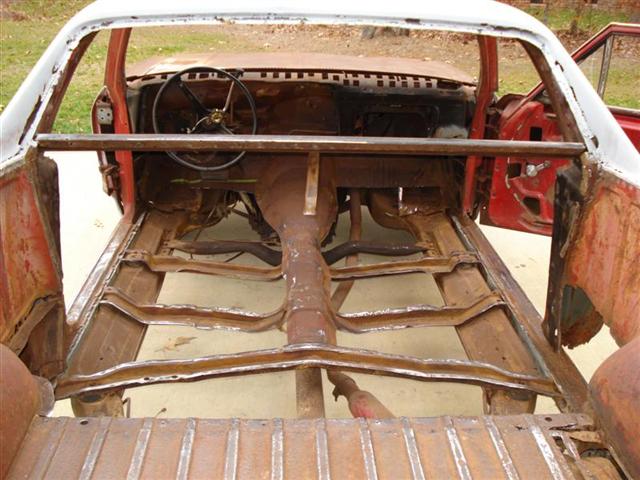 old car project with floor panels removed