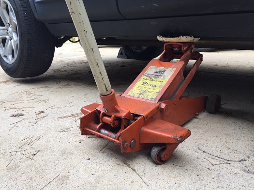 automotive restoration tools and equipment repair an old floor jack